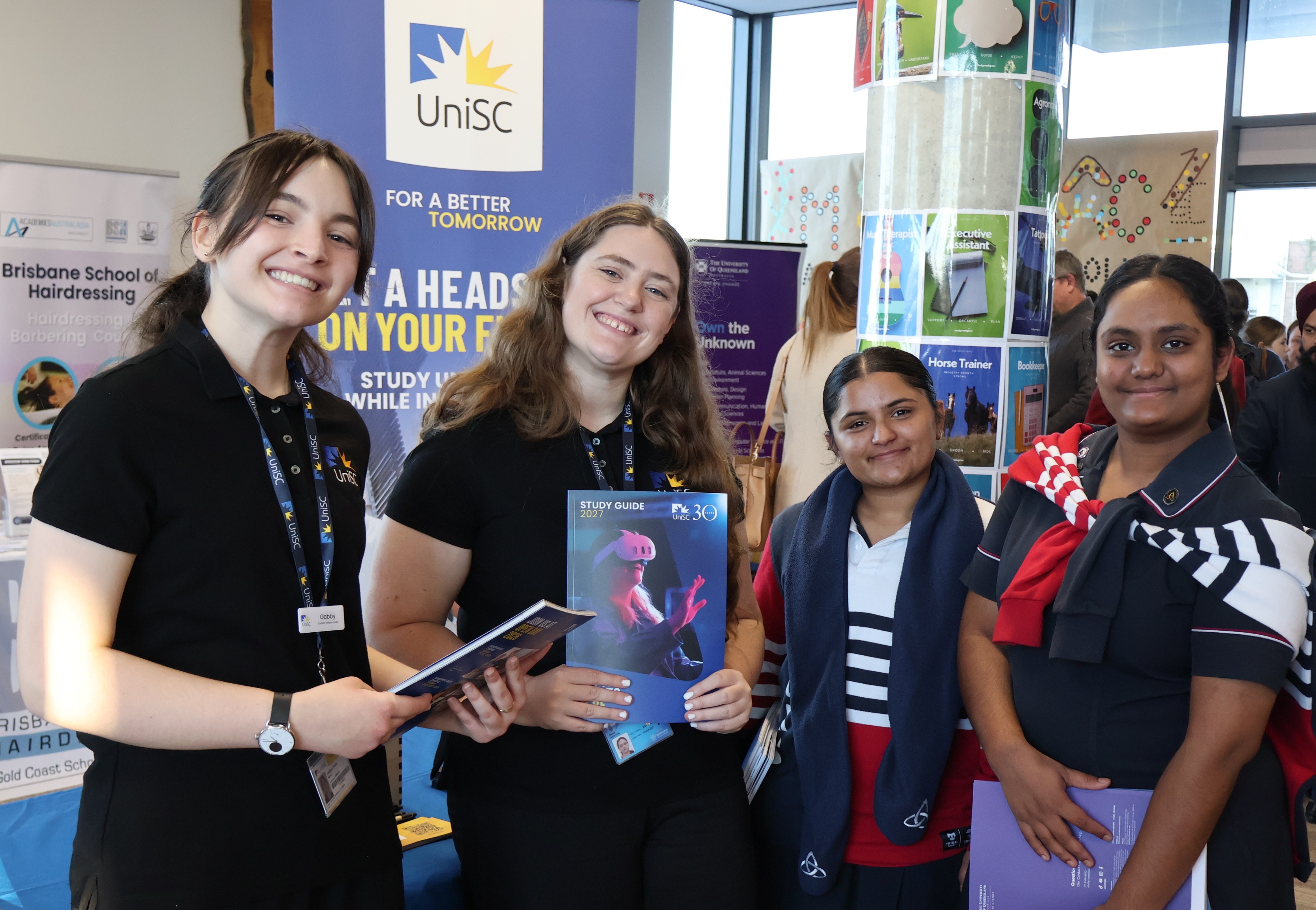 Mary MacKillop College students with representatives from UniSC. 